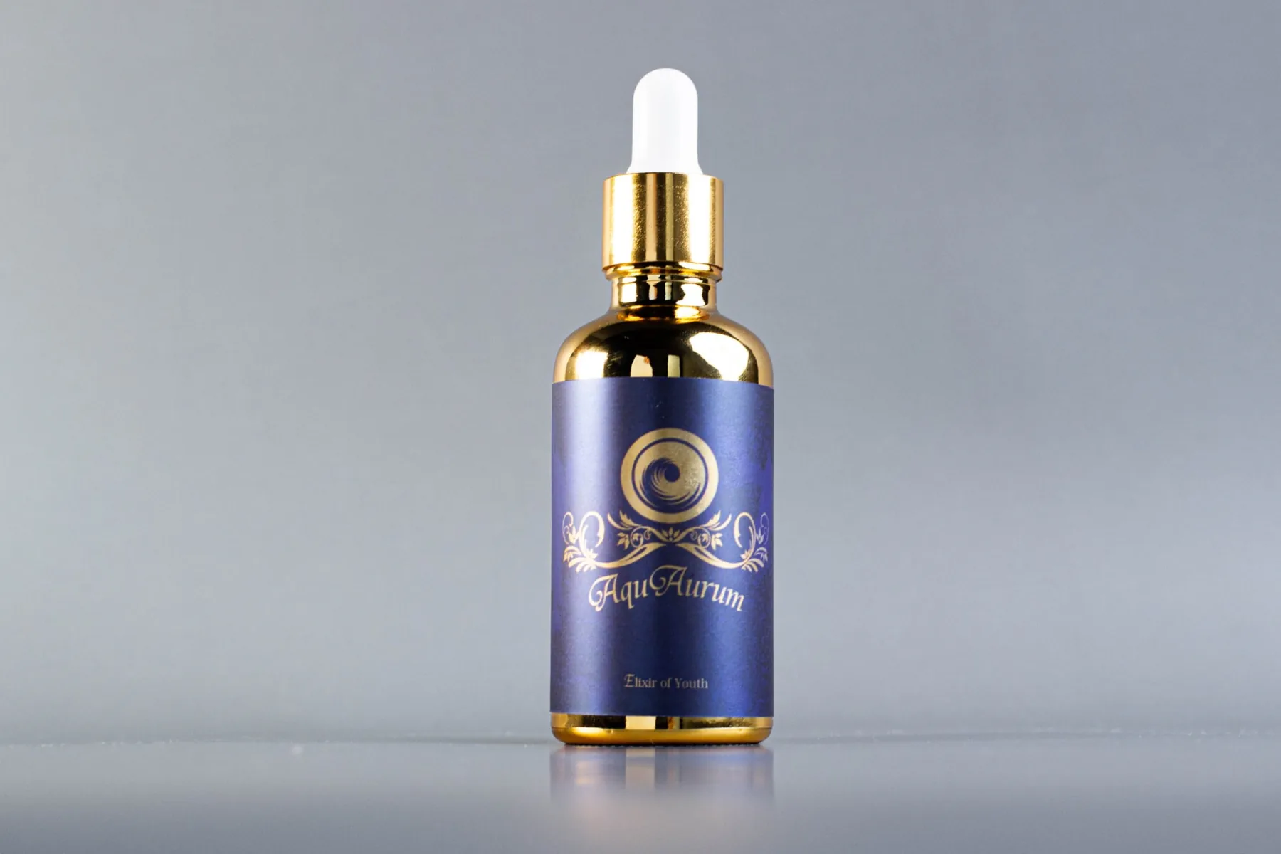 AquAurum gold dropper bottle with a deep blue label
