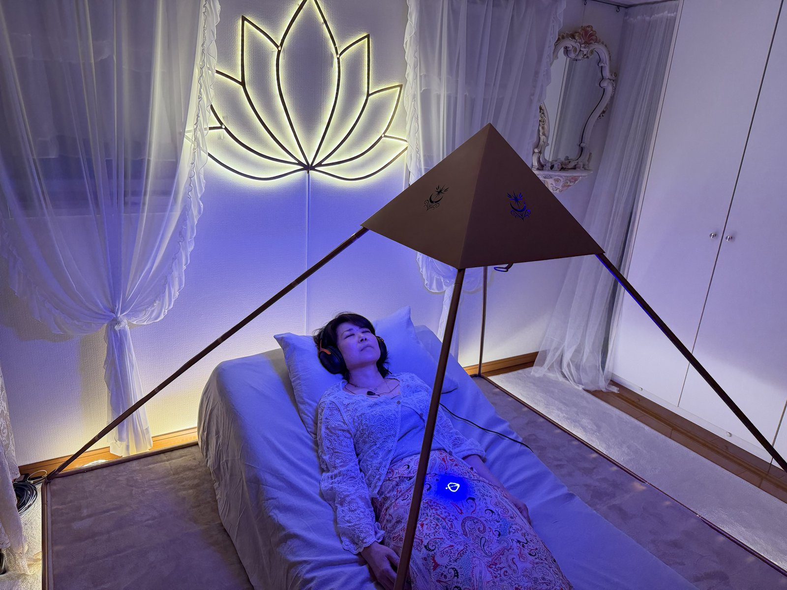 Light Mandalas Luminara Pyramid wellness session with lotus light in a private sanctuary room