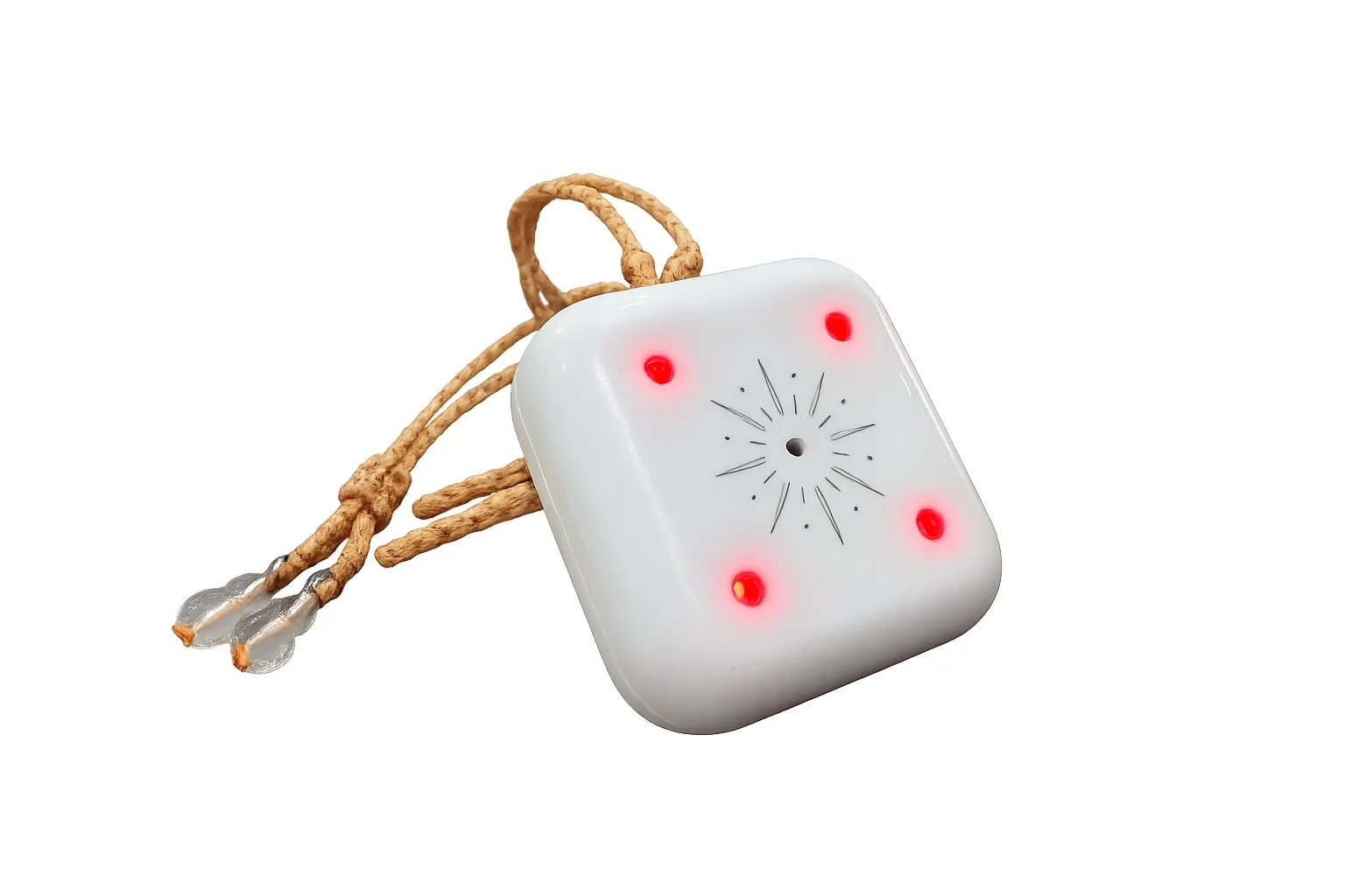 Close studio view of the Mandala Breeze pendant glowing against a graphite and amber background